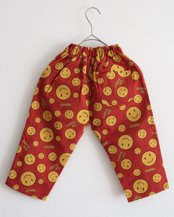 キッズ 綿100％ スマイル モチーフ ロングパンツ エンジ